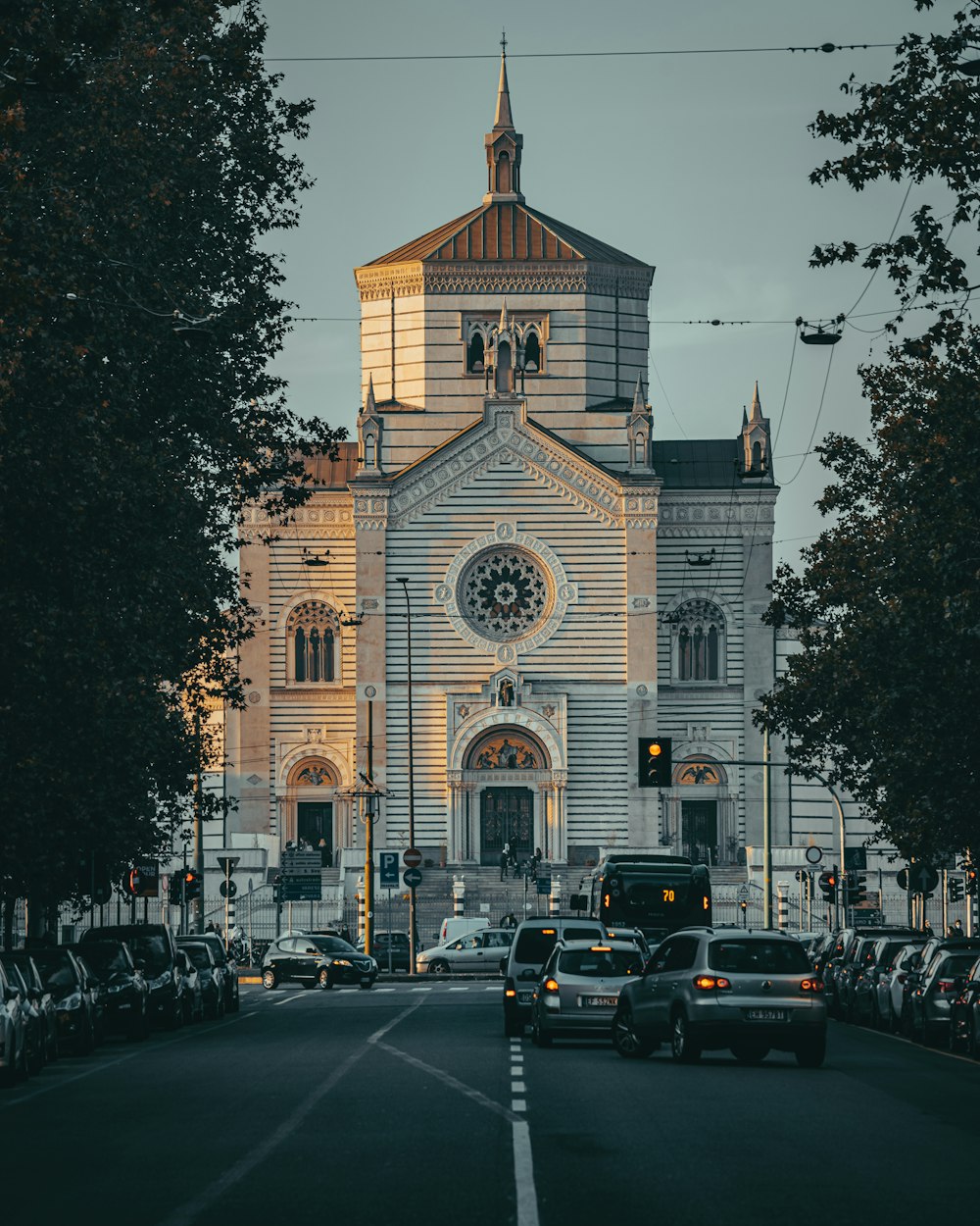 a large church with a clock on the front of it