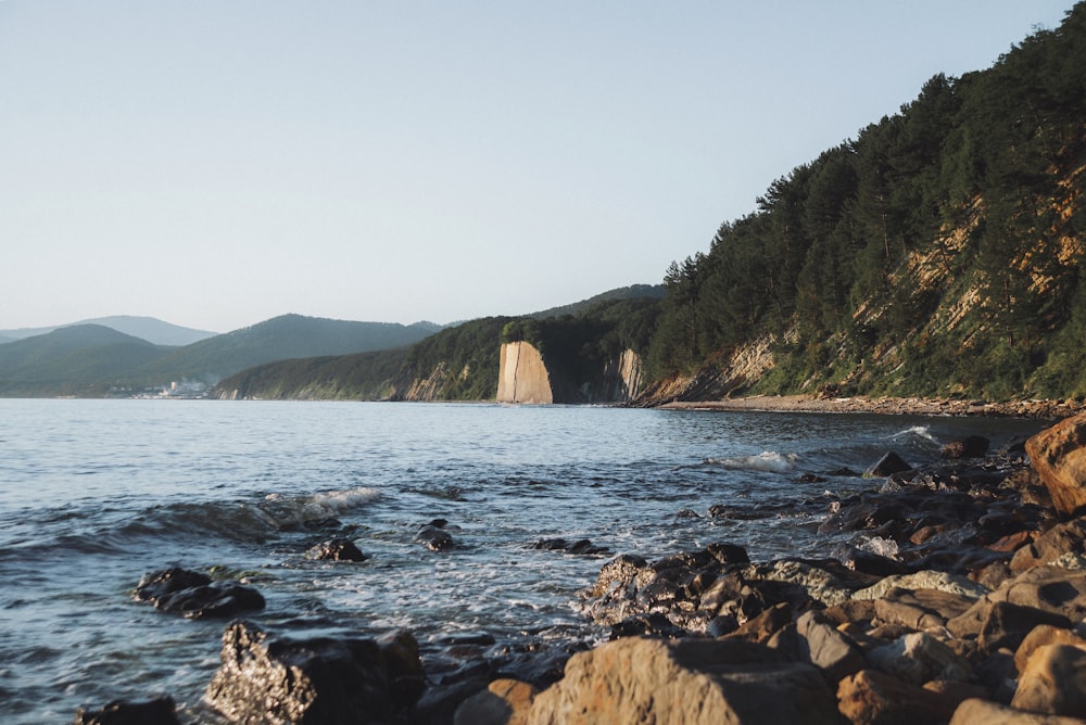 a large body of water surrounded by rocks