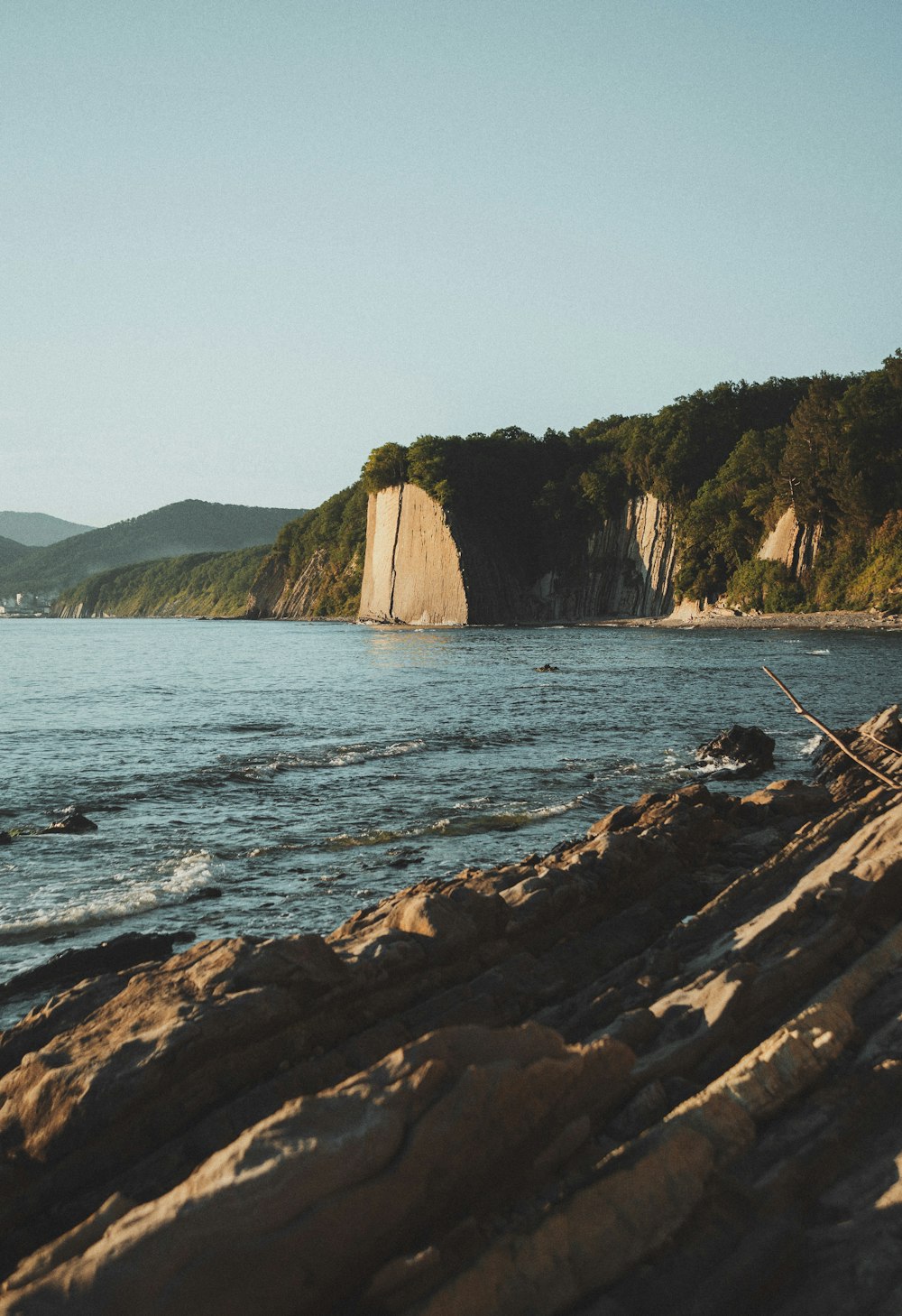 a boat sitting on top of a large body of water