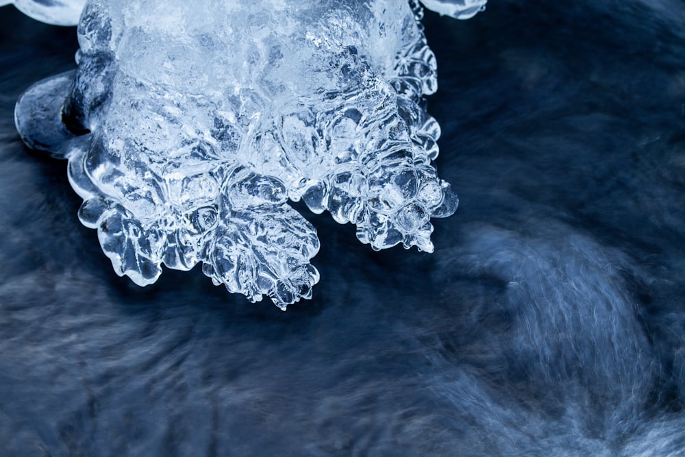 a close up of ice on the water