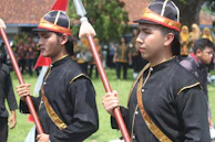 An event staff team in sleek, custom-designed uniforms coordinating smoothly.