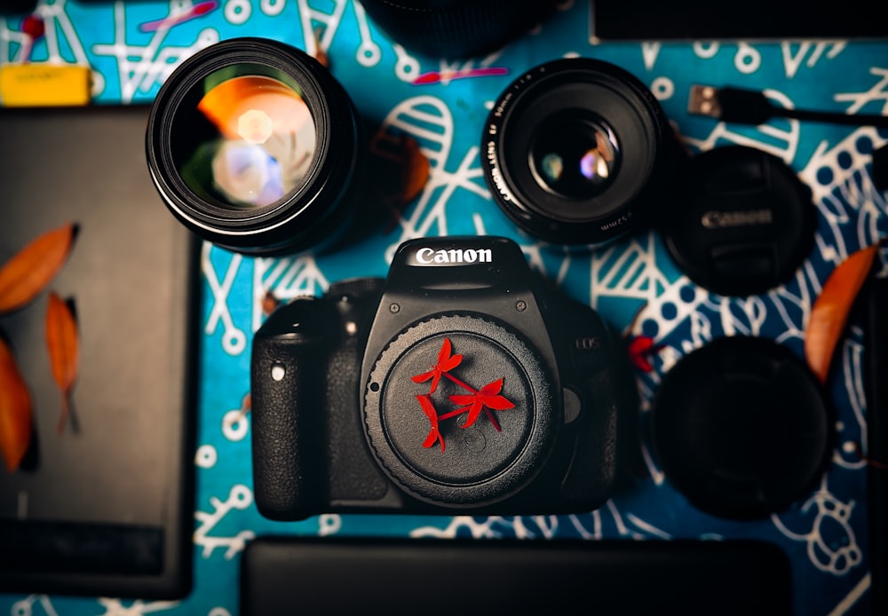 a camera sitting on top of a blue table