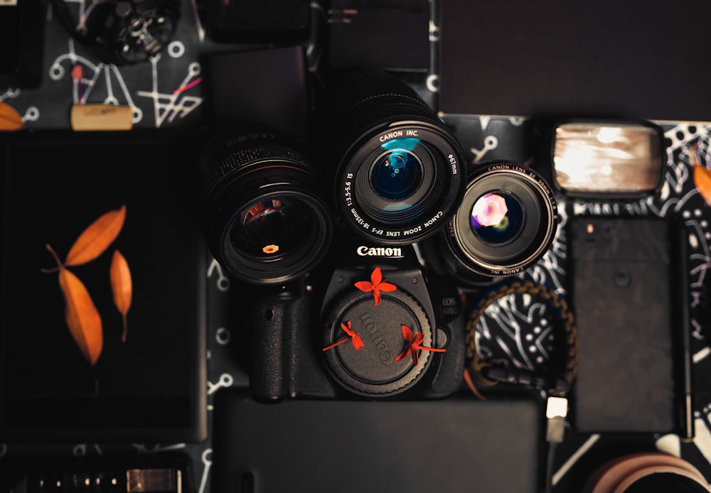 a group of cameras sitting on top of a table