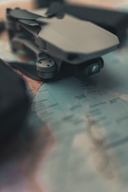 a camera sitting on top of a map