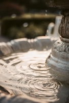 An elegant indoor fountain blending structure, color, and water movement harmoniously.