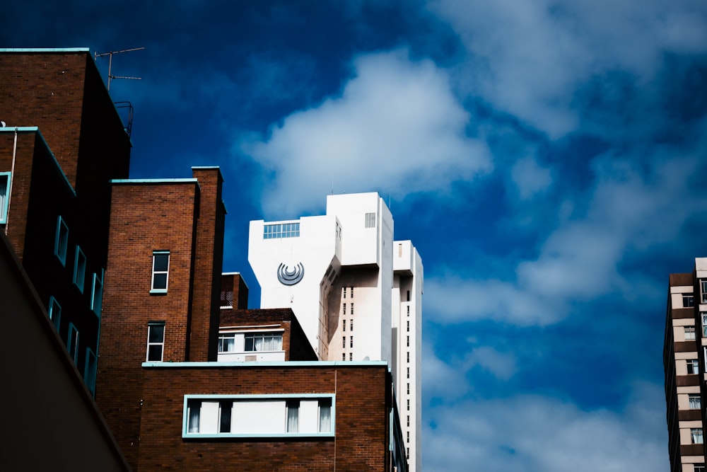 a tall building with a clock on the side of it