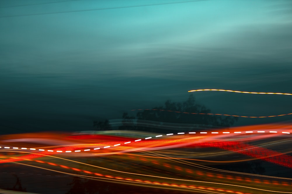 a blurry photo of a city street at night