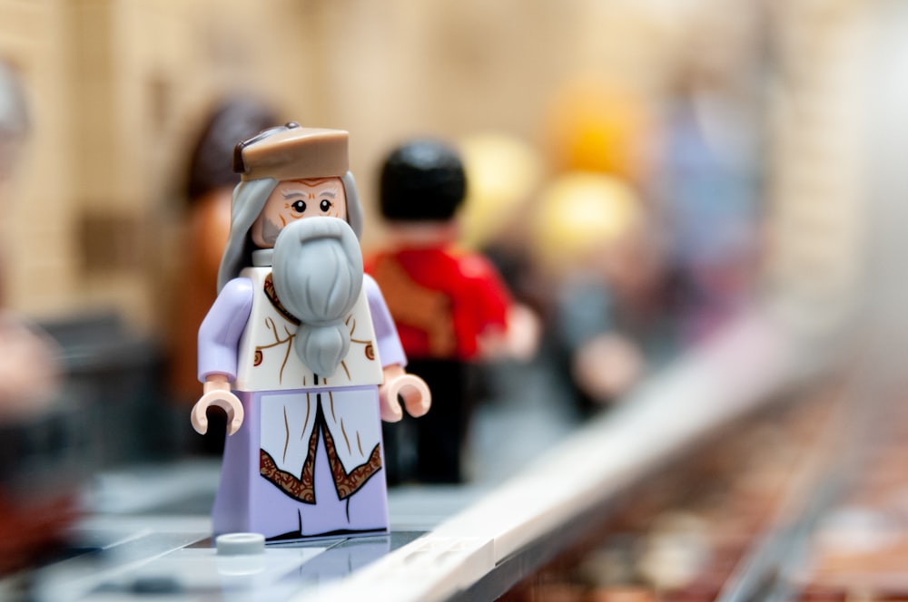 a lego figurine of a man with a beard
