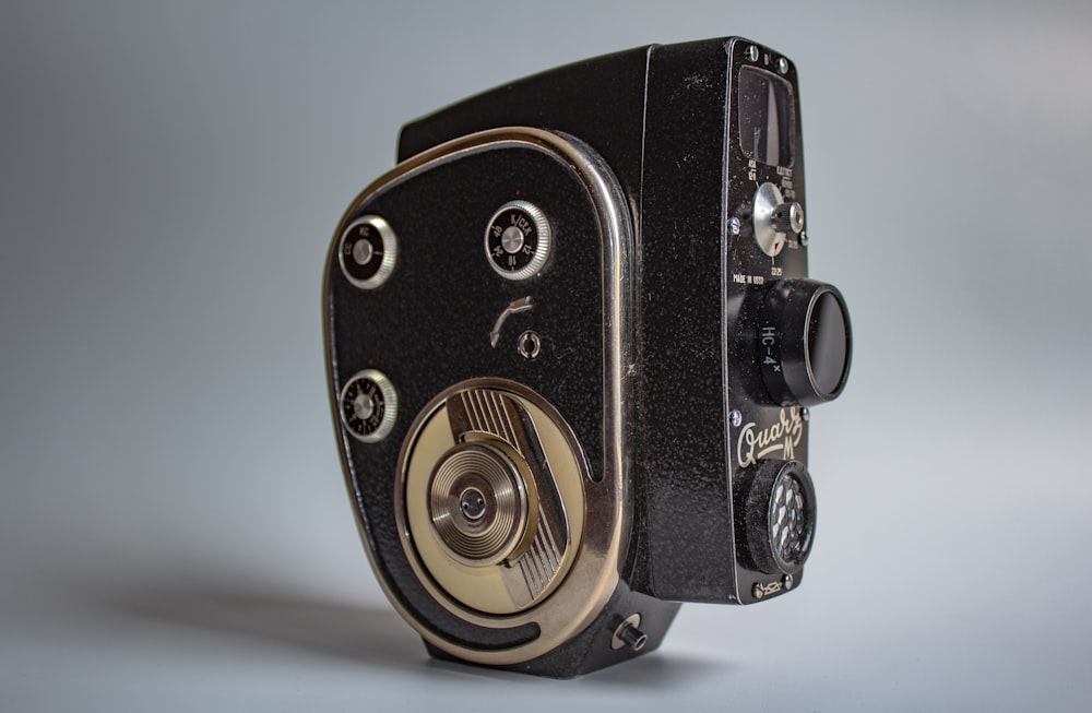 a close up of an old fashioned camera