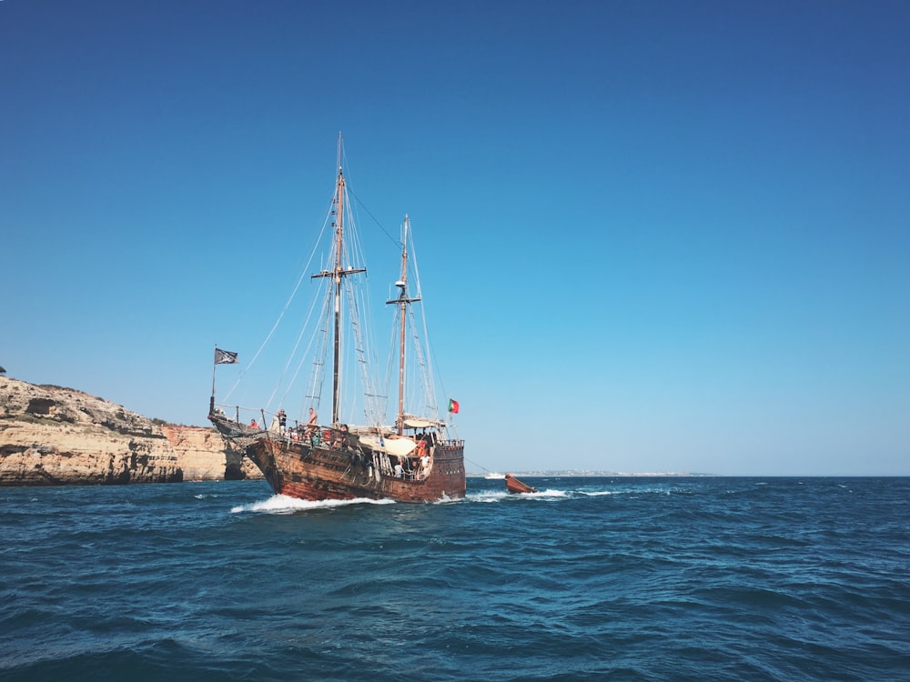 a large boat in the middle of a body of water