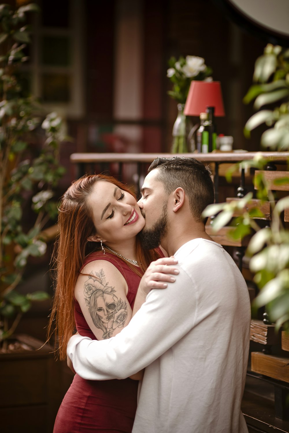 a man and a woman embracing each other