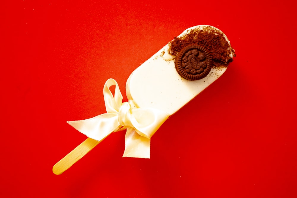 an oreo cookie wrapped in a white ribbon