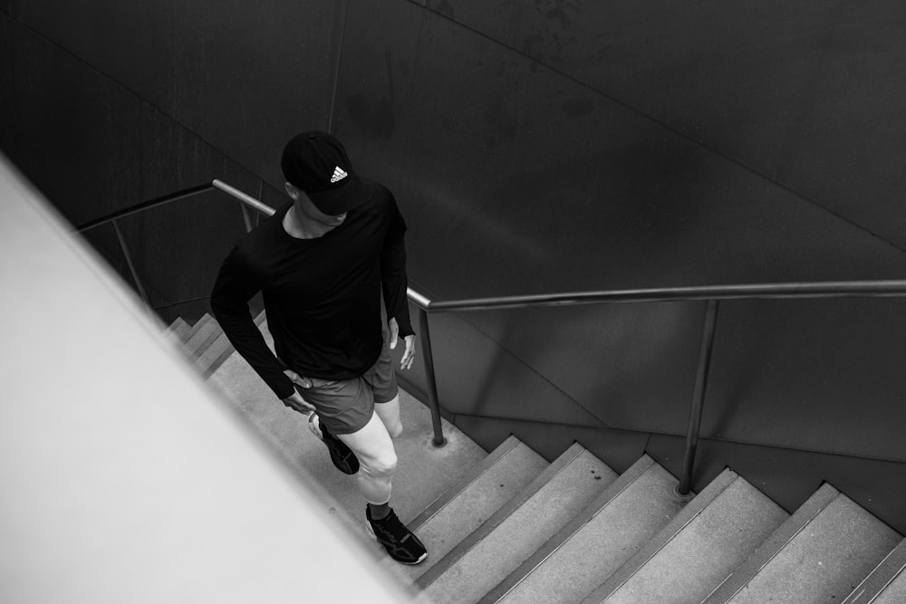 a man walking up a flight of stairs