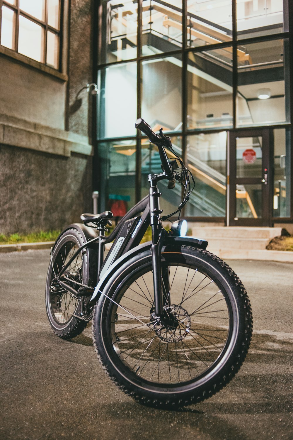 a bicycle parked in front of a building