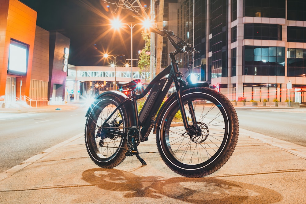 a bicycle parked on the side of the road