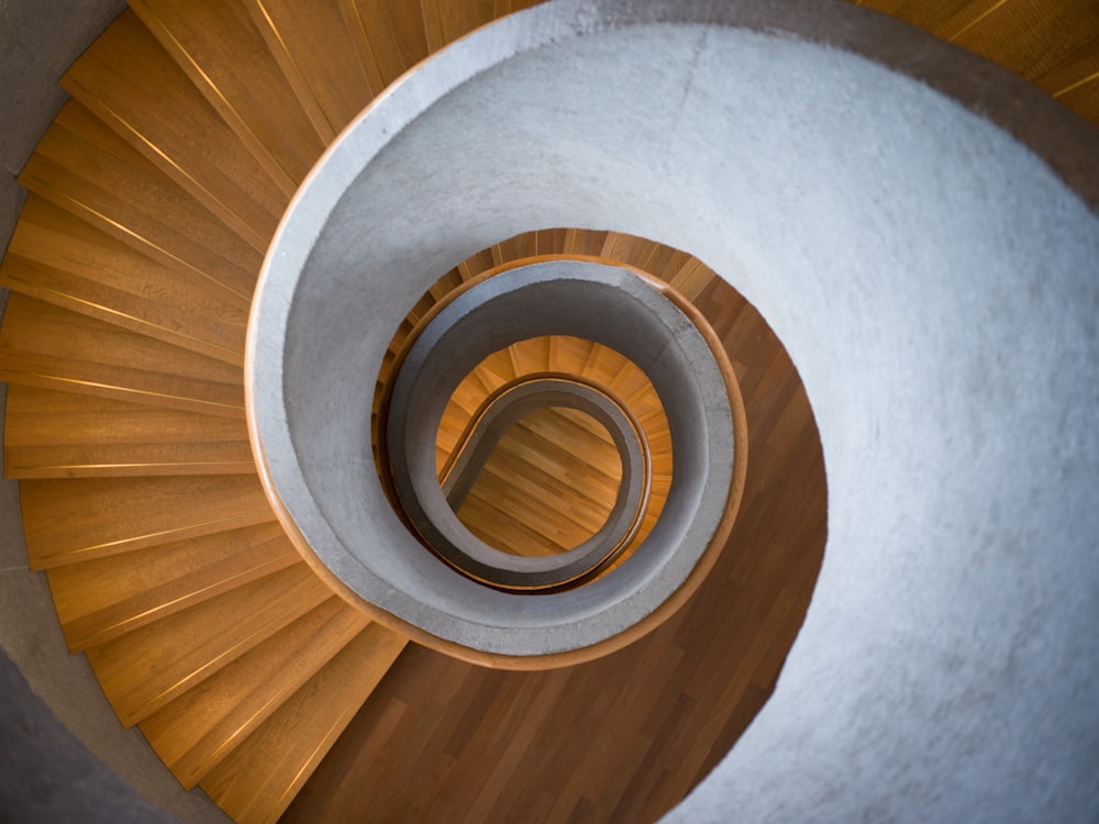 a close up of a spiral staircase in a building