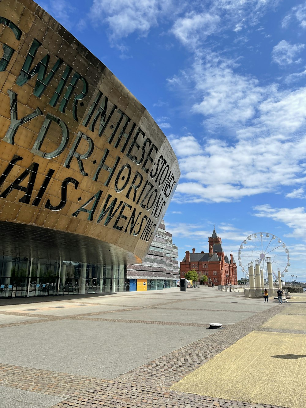 a large building with a clock on the side of it