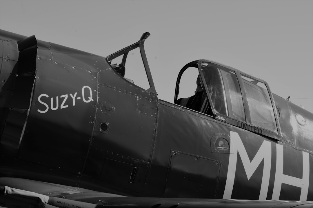 a black and white photo of an old airplane,
