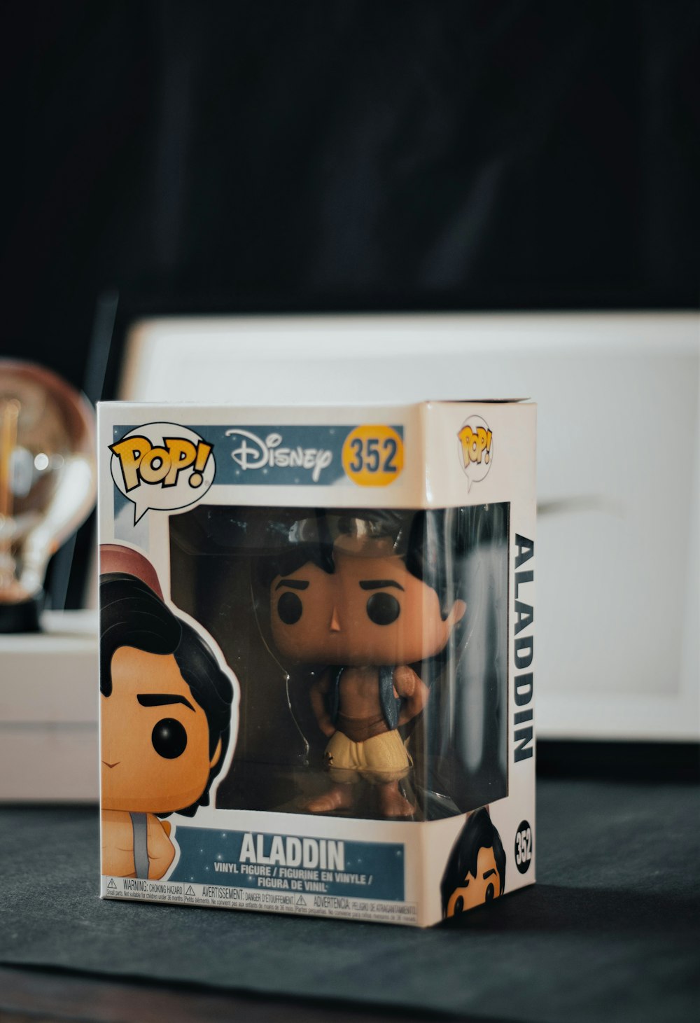 a box with a pop vinyl figure inside of it