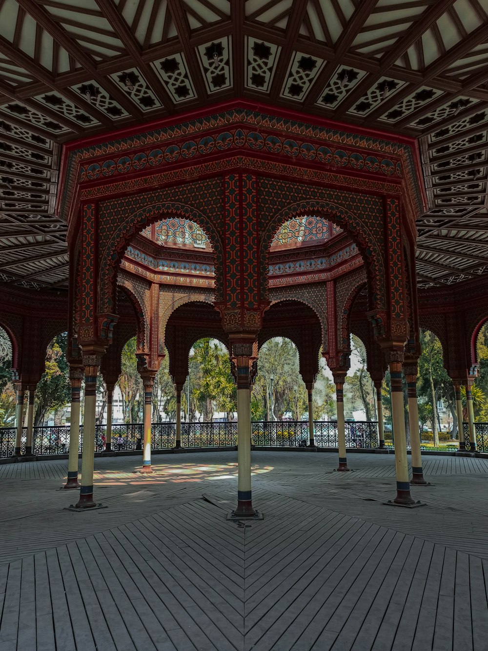 a large building with many pillars and arches