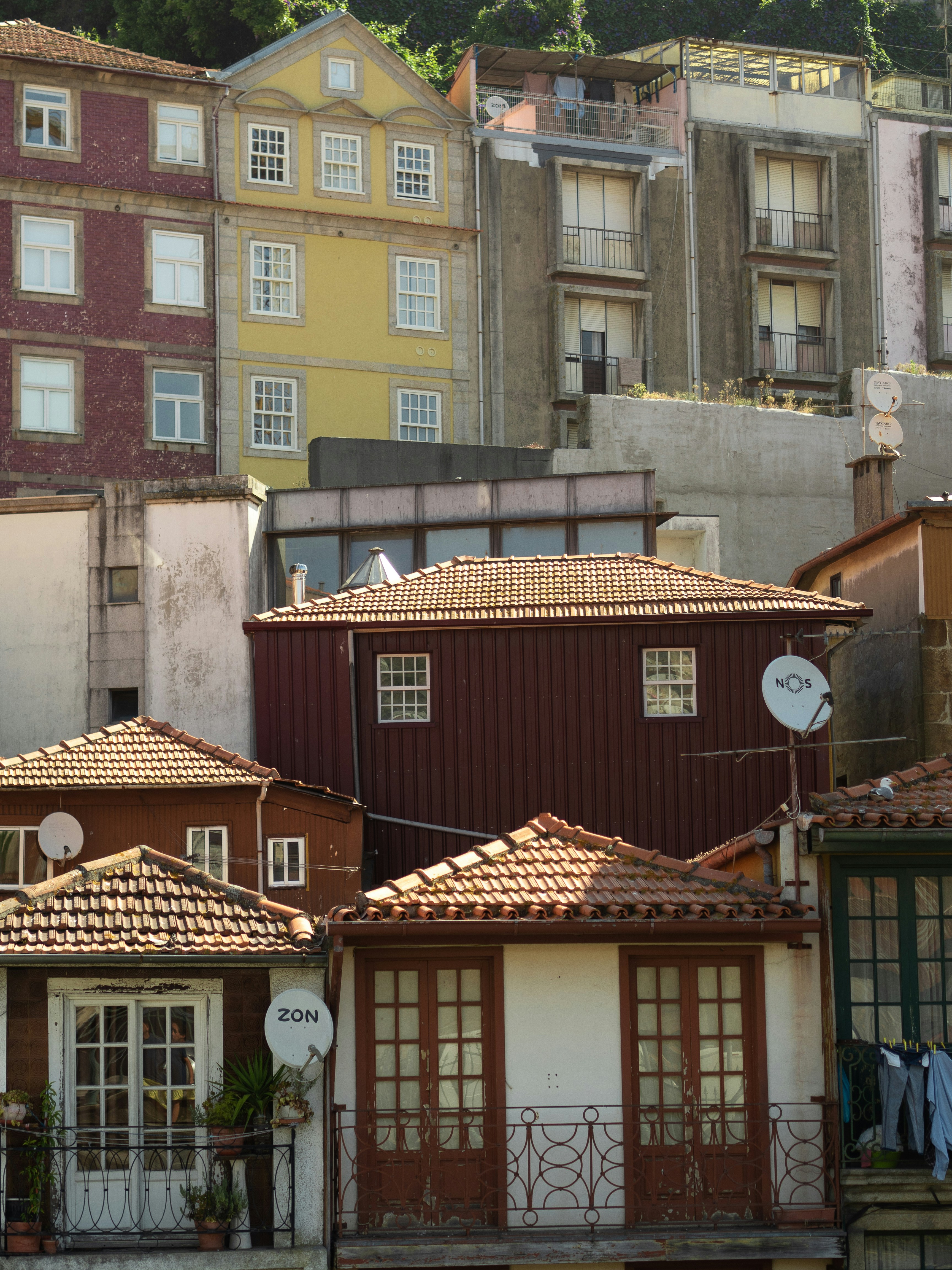 a group of buildings with a clock on the top of them