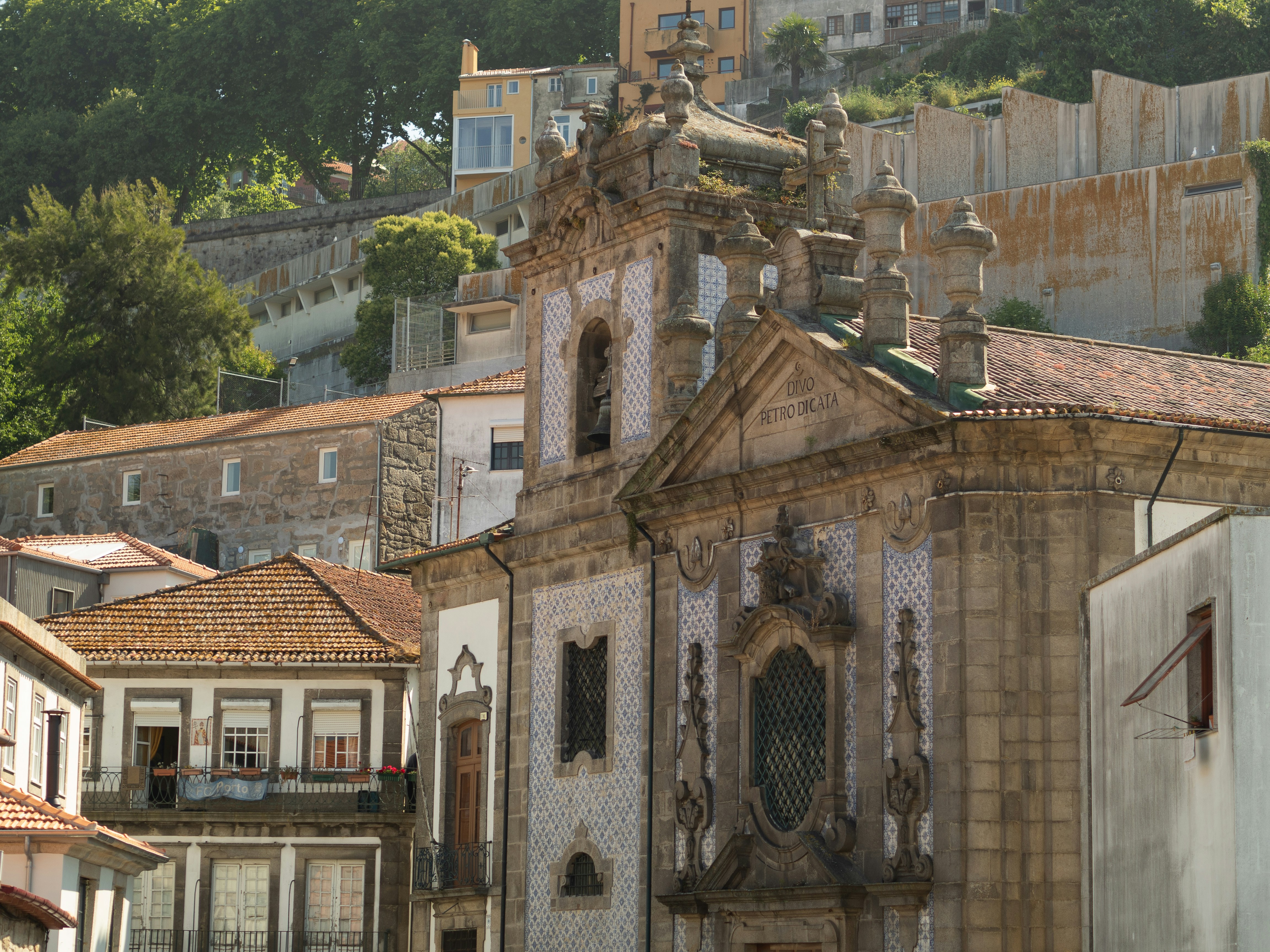 an old church with a steeple in the background