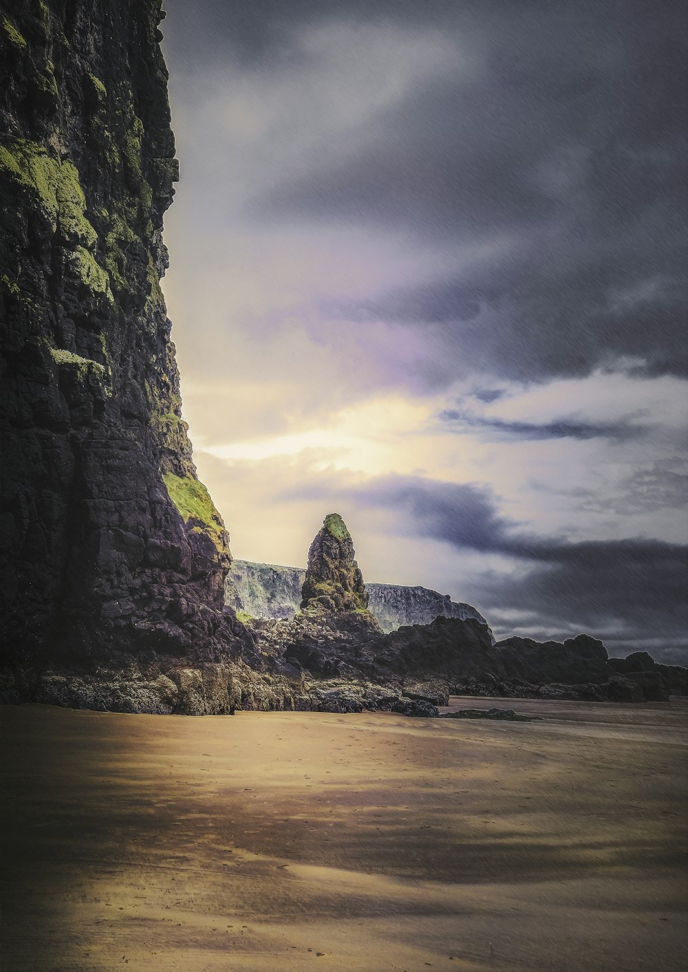 a rock formation on the shore of a beach