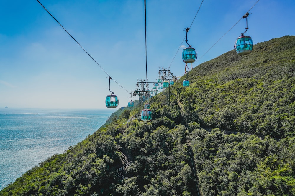 a scenic view of the ocean from a cable car