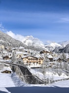 Snow-capped mountains and cozy cottages in Himachal Dharamshala.