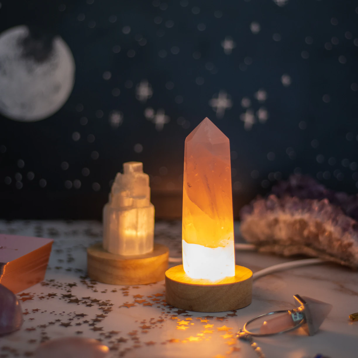 a table topped with lots of different types of lights