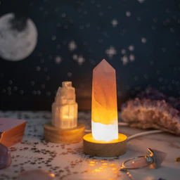 a table topped with lots of different types of lights