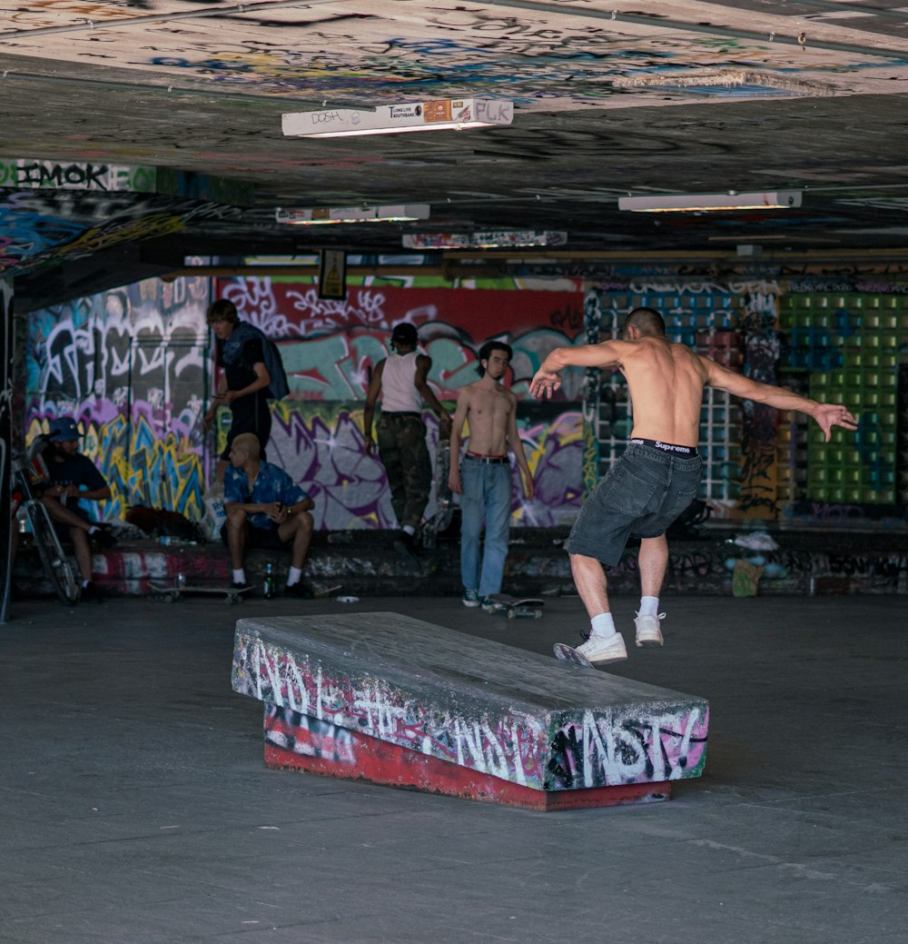 a man is doing a trick on a skateboard