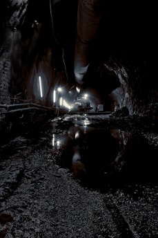 a dark tunnel filled with lots of water