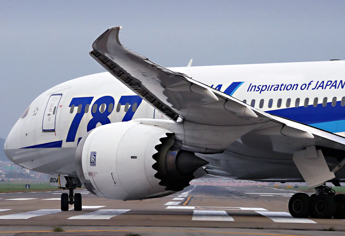 Jet airliner in flight against a blue sky