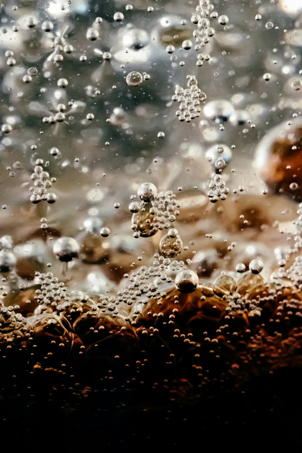 a close up of water bubbles on a surface