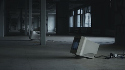 white crt computer monitor on white table