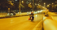 Night view of Istanbul with a Konum Kurye motorcycle riding under city lights