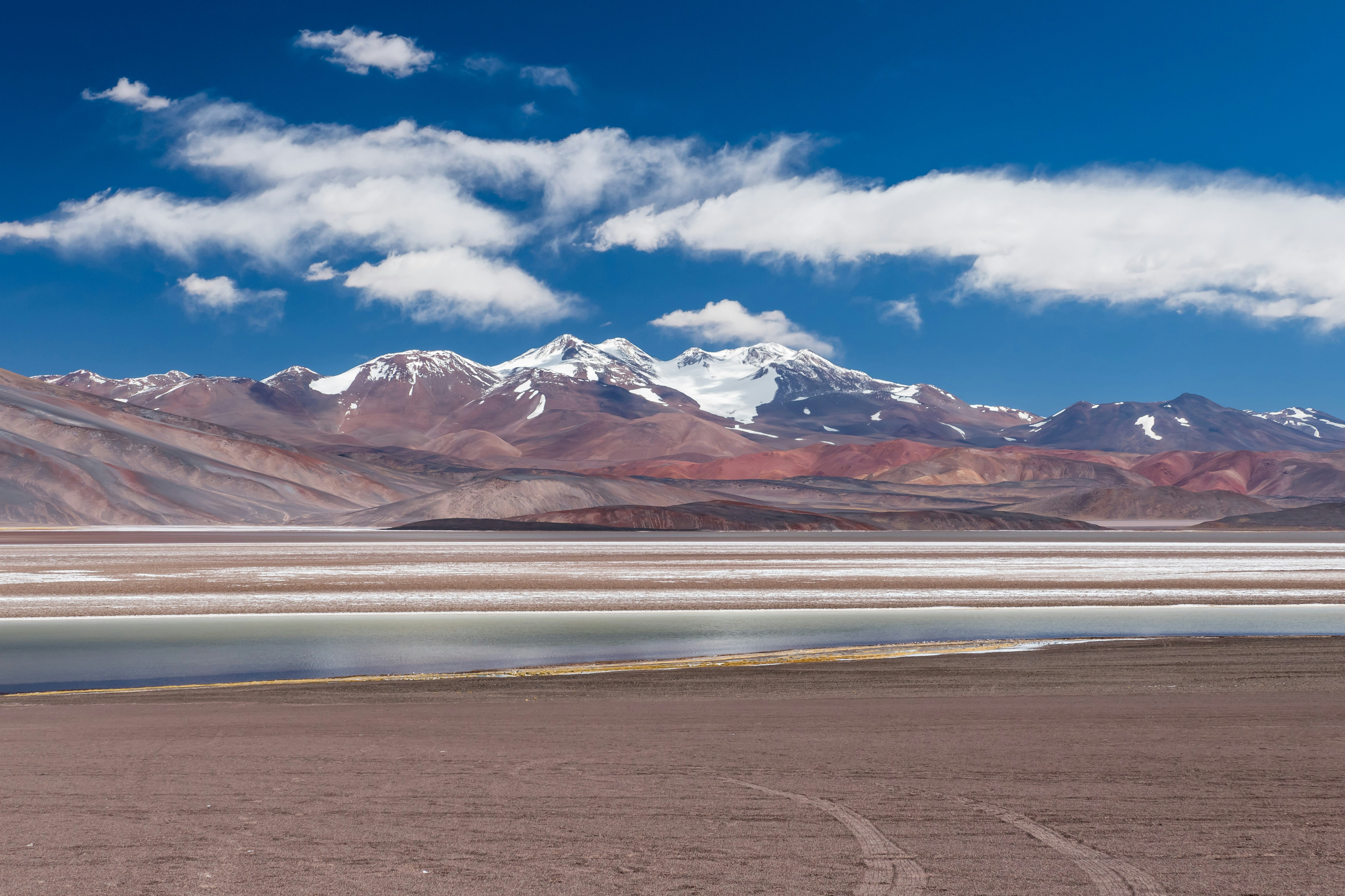a large body of water surrounded by mountains