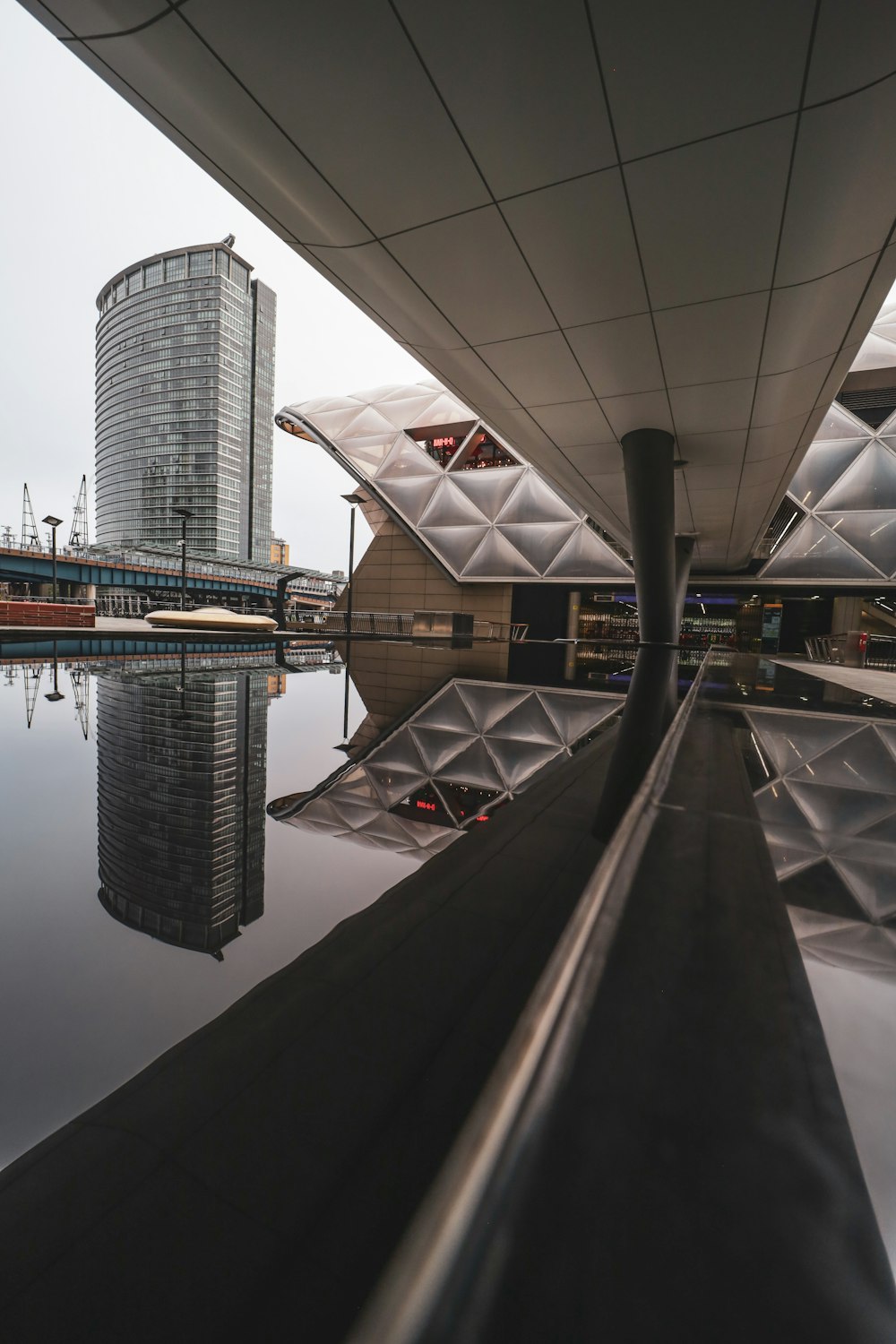 a view of a building from across a body of water