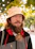 a man with a beard wearing a hat
