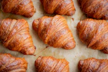 a bunch of croissants that are on a table