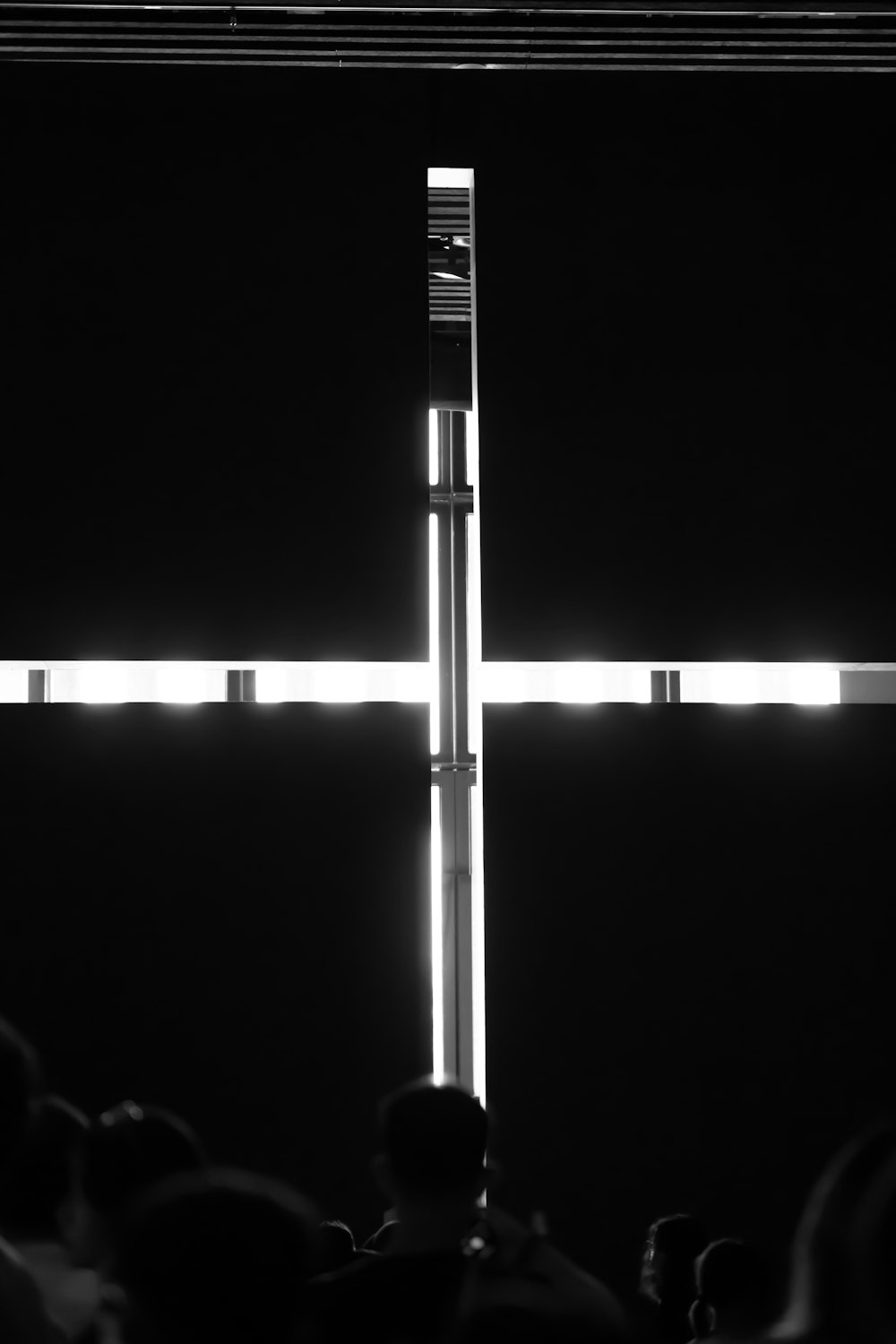 a black and white photo of a cross