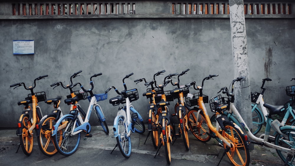 a group of bicycles parked next to each other