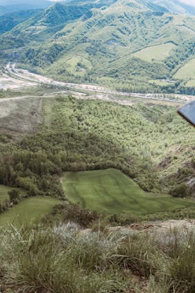 Scenic view of the 18-hole pitch and putt golf course surrounded by lush greenery in Ribeira Sacra.