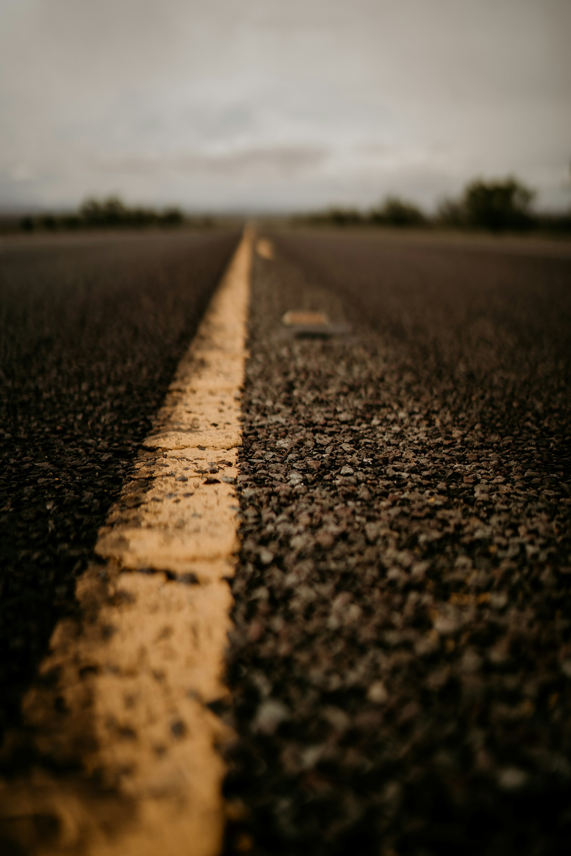 a yellow line on the side of a road