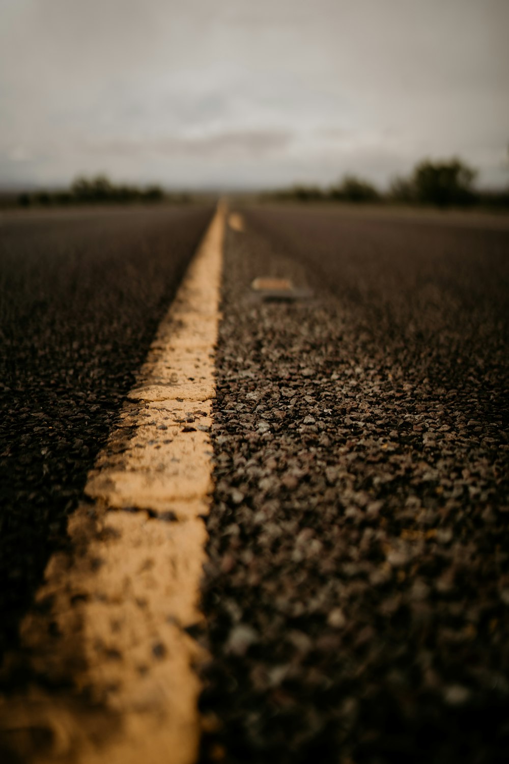 a yellow line on the side of a road