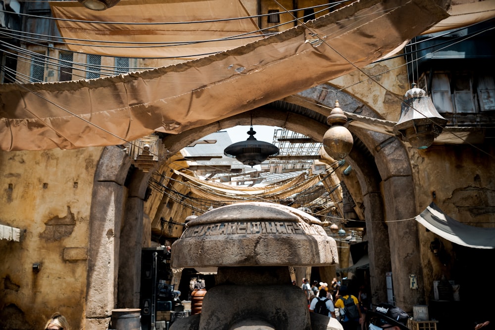 a street with a statue in the middle of it