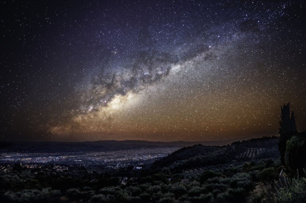 a night view of the milky over a city