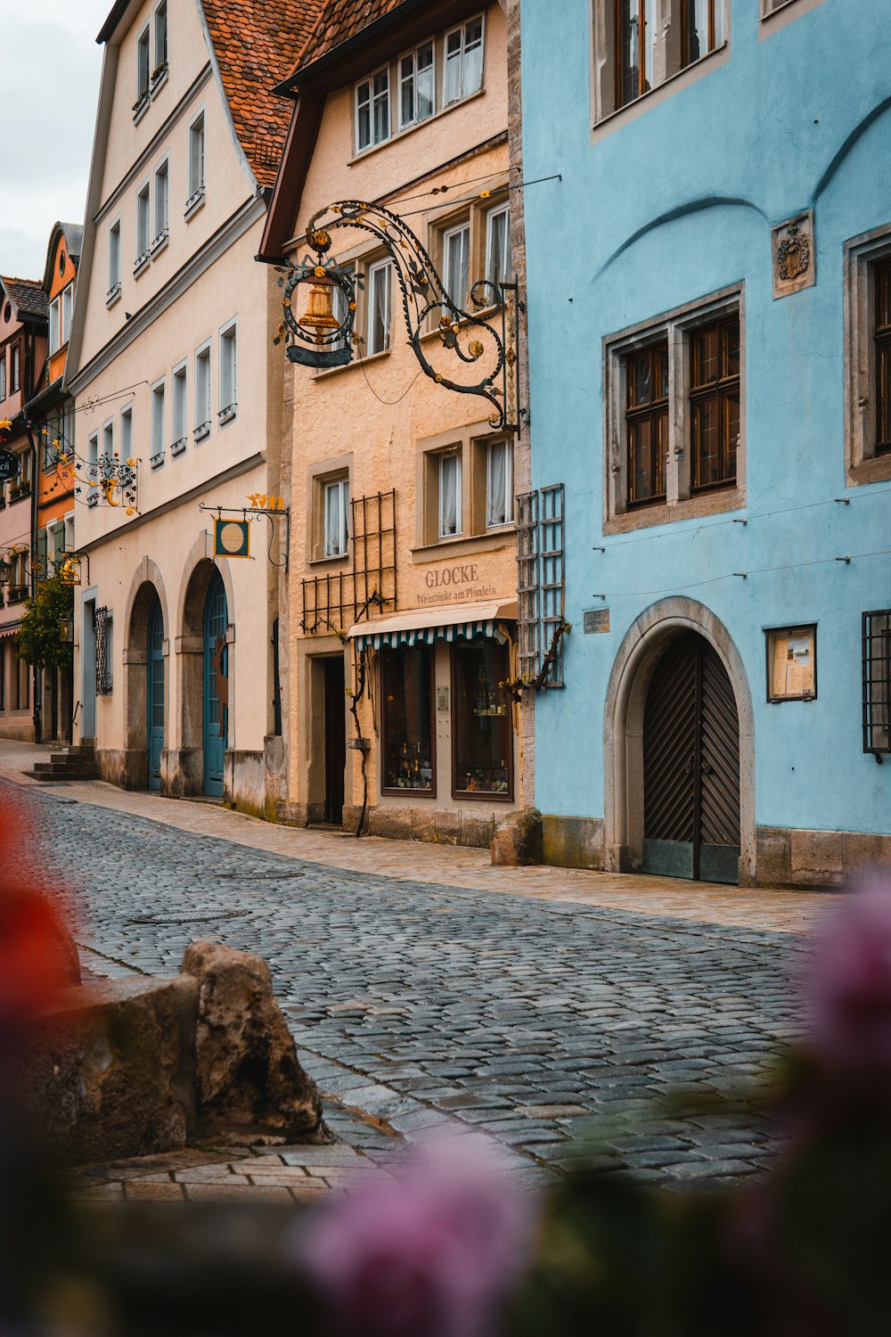 a cobblestone street in a european city