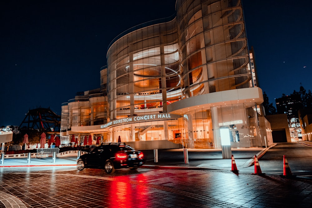 a car is parked in front of a building